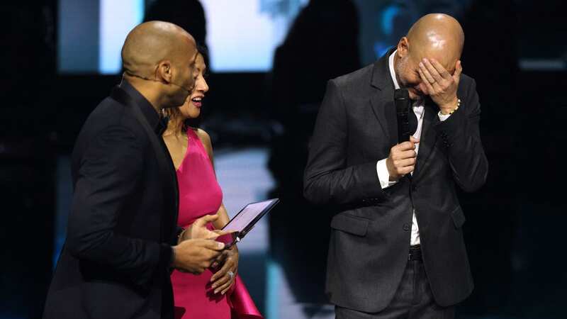 Pep Guardiola reacts after a question from Thierry Henry (Image: Getty Images)
