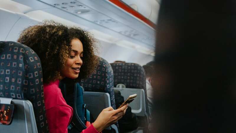 Wearing red on a plane could have some major benefits (stock image) (Image: Getty Images)