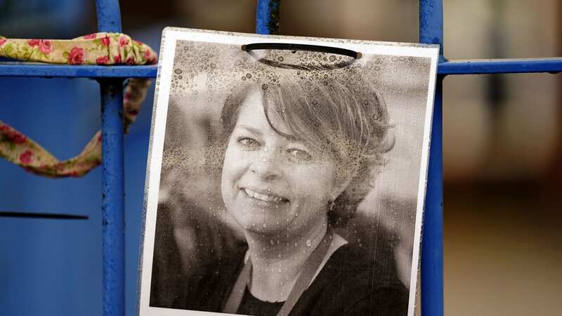 A photograph of Ruth Perry attached to the fence outside John Rankin Schools (Image: PA)