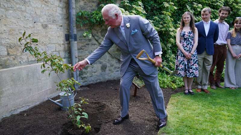 Charles carries out a ritual whenever he plants a tree (Image: PA)