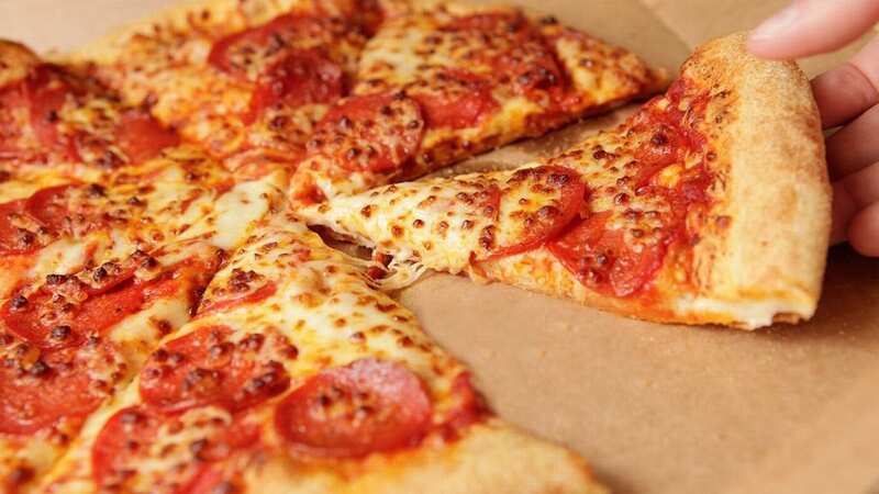 We all love a good pizza - but how do you get it to be crispy for longer? (Stock photo) (Image: Domino
