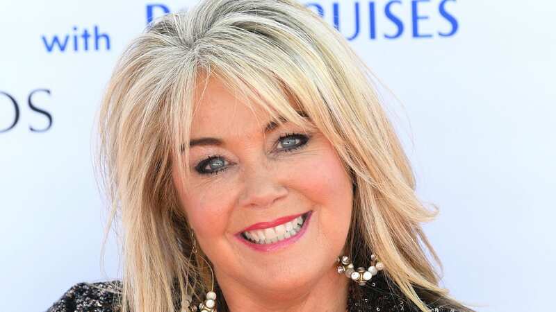 Lucy Alexander made a name for herself as the presenter of Homes Under the Hammer (Image: Getty Images)