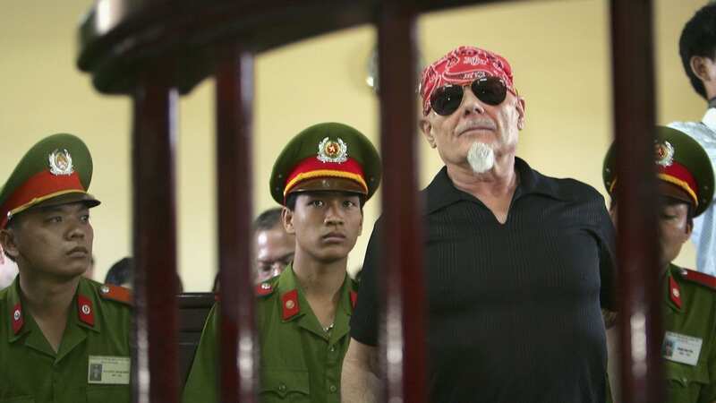Gary Glitter behind bars in Vietnam in 2006 (Image: Getty Images)