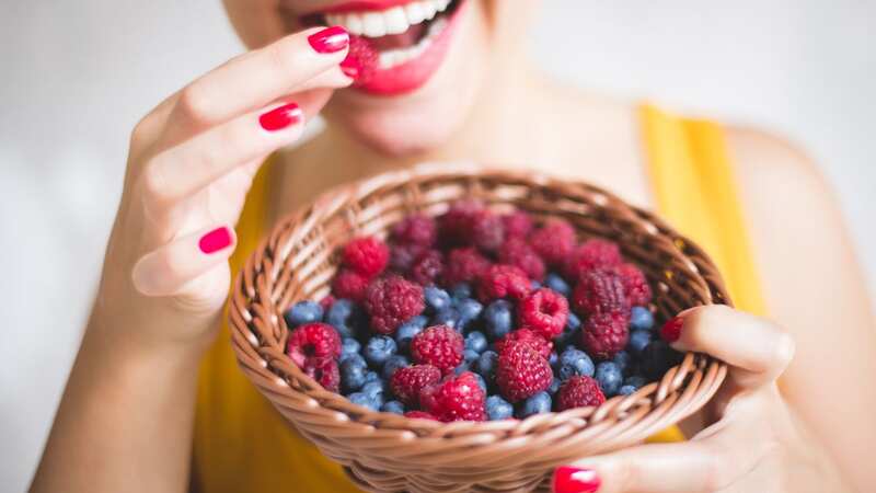 Adding berries such as blueberries and raspberries into your diet is an easy and tasty way to lower your cholesterol. (Image: Getty Images)