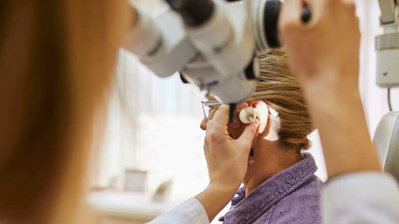 2.3million people in the UK need earwax treatment every year (Image: Getty Images/Westend61)
