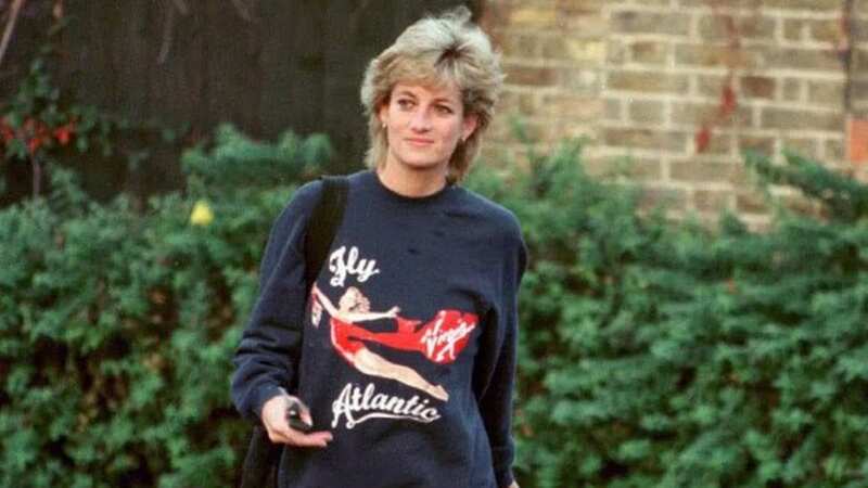 The Princess paired the famous sweatshirt with orange cycling shorts