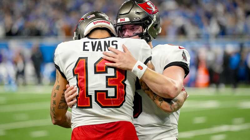 DETROIT, MICHIGAN - JANUARY 21: Baker Mayfield #6 of the Tampa Bay Buccaneers embraces Mike Evans #13 of the Tampa Bay Buccaneers after throwing an interception against the Detroit Lions during the fourth quarter of the NFC Divisional Playoff game at Ford Field on January 21, 2024 in Detroit, Michigan. (Photo by Nic Antaya/Getty Images) (Image: Getty)