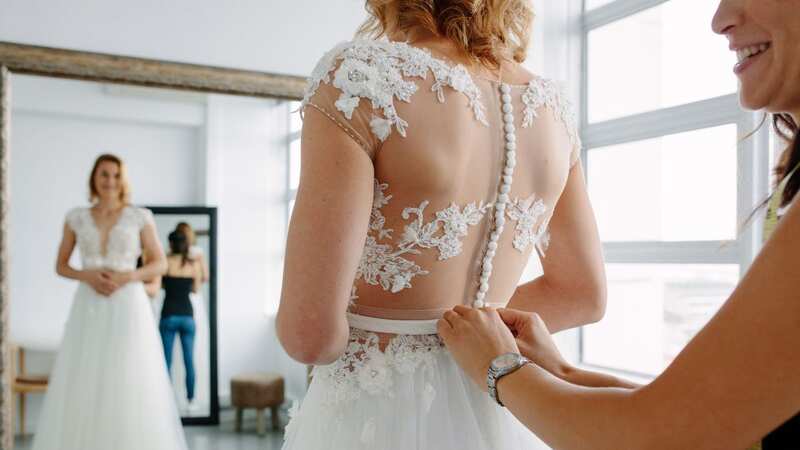 The month you buy your wedding dress could make a difference to cost (Image: Getty Images/iStockphoto)