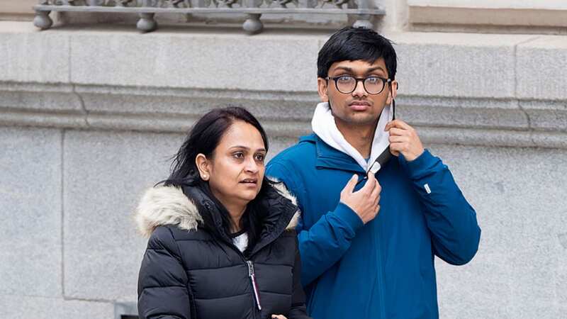 Easyjet bomb hoaxer British national Aditya Verma outside court in Madrid today with his family (Image: SOLARPIX.COM)