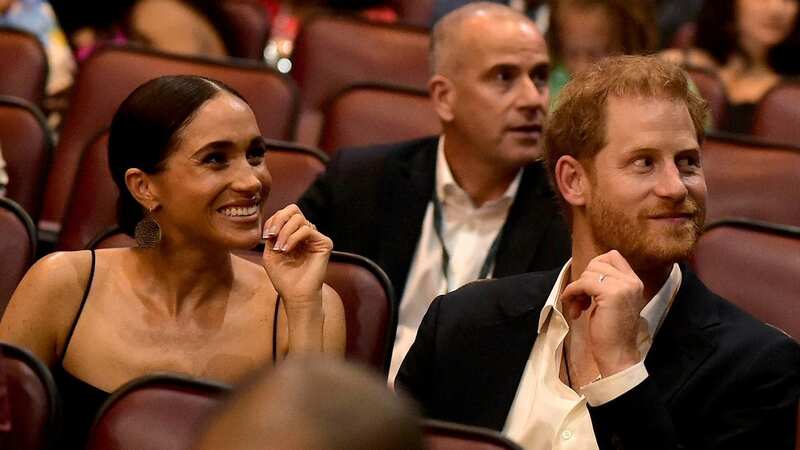The Duke and Duchess of Sussex, Prince Harry and Meghan Markle, seemingly suffered a very awkward moment at a glitzy film premiere when they were given 