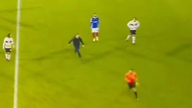 A Port Vale fan ran onto the pitch to confront referee Craig Hicks in their match against Portsmouth (Image: EFL/iFollow via Twitter)