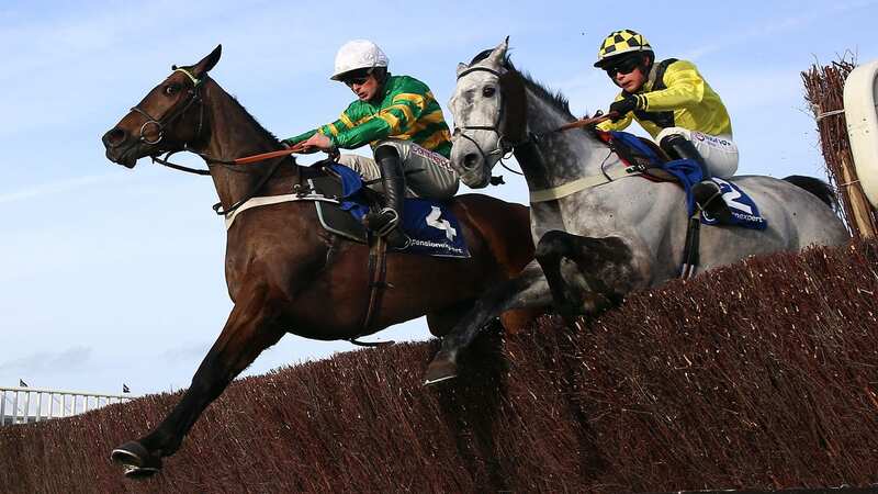 Elixir De Nutz ridden by jockey Freddie Gingell (right) race alongside Jonbon and James Bowen in the My Pension Expert Clarence House Chase (Image: PA)