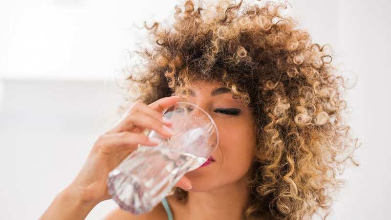 Experts recommend drinking eight glasses of water a day (Image: Getty Images/iStockphoto)
