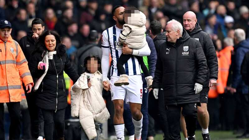 Kyle Bartley raced into the crowd to pick up his kids (Image: Getty Images)