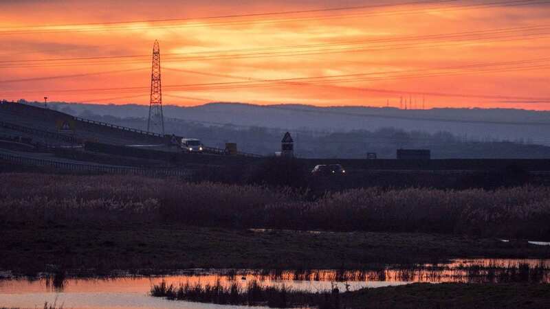 A sunset over Sheppey Crossing as a Sahara dust cloud sweeps across the UK (Image: Alamy Live News.)