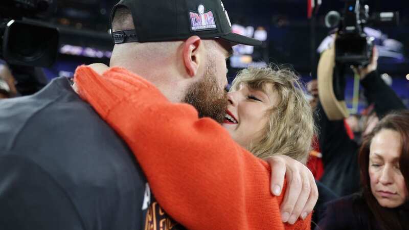 Taylor Swift kissed Travis Kelce on the field after the Chiefs beat the Ravens (Image: 2024 Getty Images)