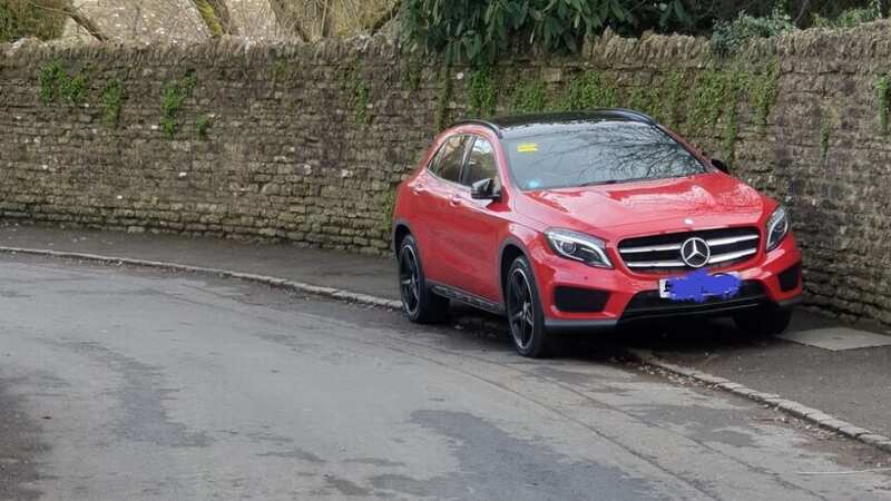 Visitors were captured parking on the curb in Bibury (Image: Gloucestershire police)