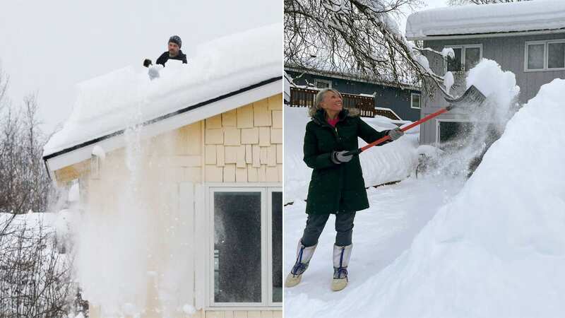 A man uses a shovel to remove snow from his roof as advised by Anchorage officials (Image: AP)