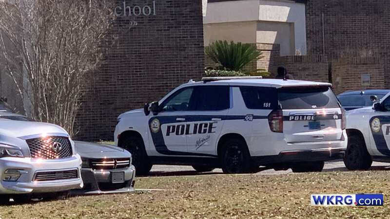 Multiple officers with the Mobile Police Department are on the scene of Leflore High School