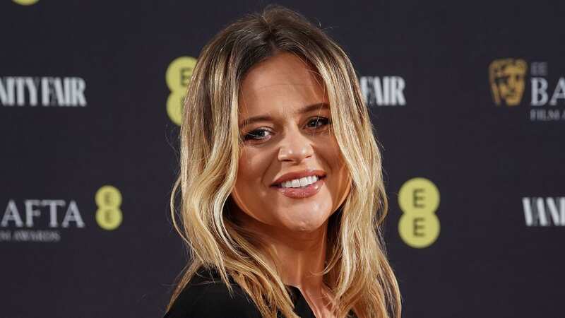 Emily Atack wowed as she showed off her baby bump on the red carpet (Image: PA)
