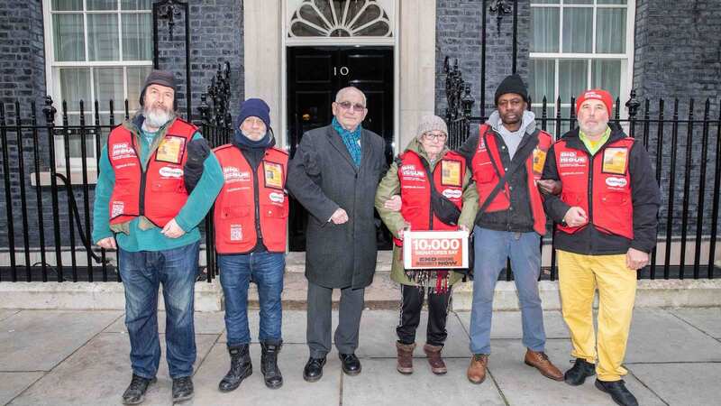 Big Issue founder Lord Bird with Big Issue vendors handing in a petition to the Prime Minister calling for support for people struggling to pay their rent (Image: Copyright remains with handout provider)