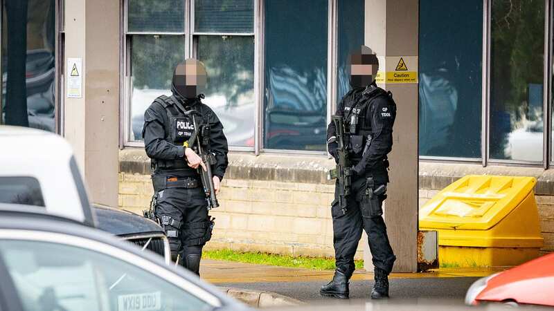 Armed police were seen stationed outside Royal United Hospital in Bath on Friday over reports of a knifeman on the loose (Image: SWNS)