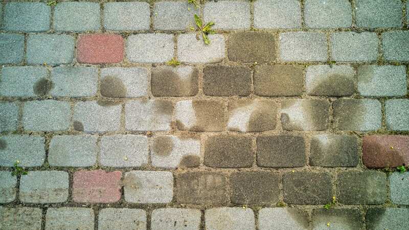 Households can clean oil stains from driveways using households staples (Image: Getty Images/iStockphoto)
