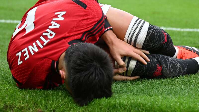 Lisandro Martinez on the ground injured during Manchester United v West Ham United (Image: Getty Images)