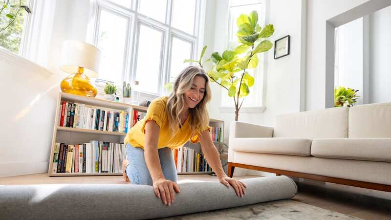 A house expert has come up with the ultimate tip to keep your rug from curling in the corners (Image: Getty Images)