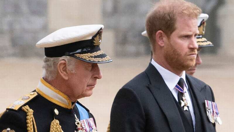King Charles with his youngest son Prince Harry (Image: POOL/AFP via Getty Images)
