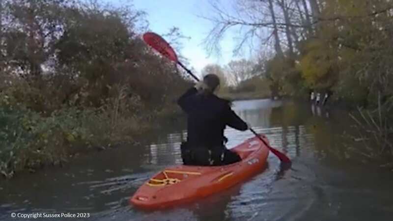 Watch as cops commandeer kayaks to arrest drunk driver who plunged into river