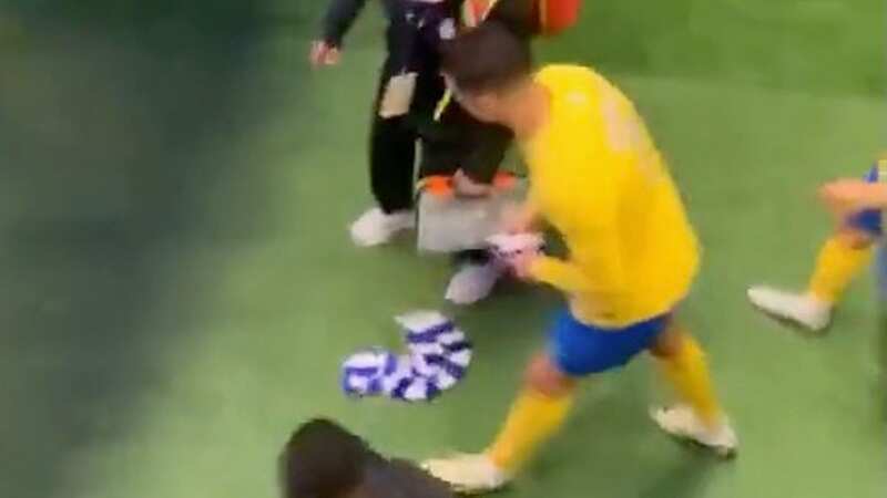 Cristiano Ronaldo was struck in the head by one scarf thrown from the crowd