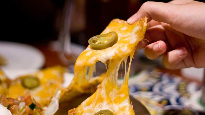Cheesy nachos are the ultimate movie marathon snack (Image: Getty Images)