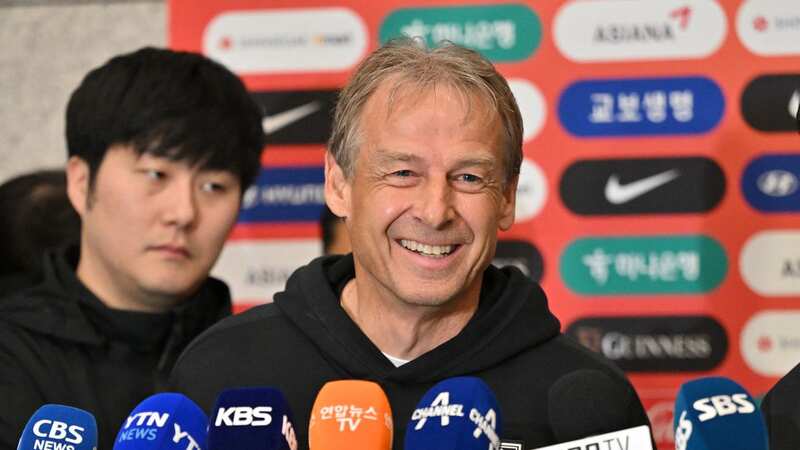 South Korea boss Jurgen Klinsmann smiles after his side were knocked out of the Asian Cup (Image: JUNG YEON-JE/AFP via Getty Images)