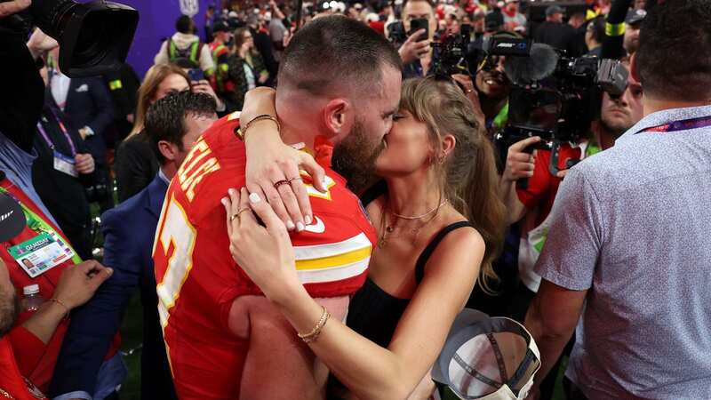 Travis Kelce and Taylor Swift smooched after the victory (Image: Getty Images)