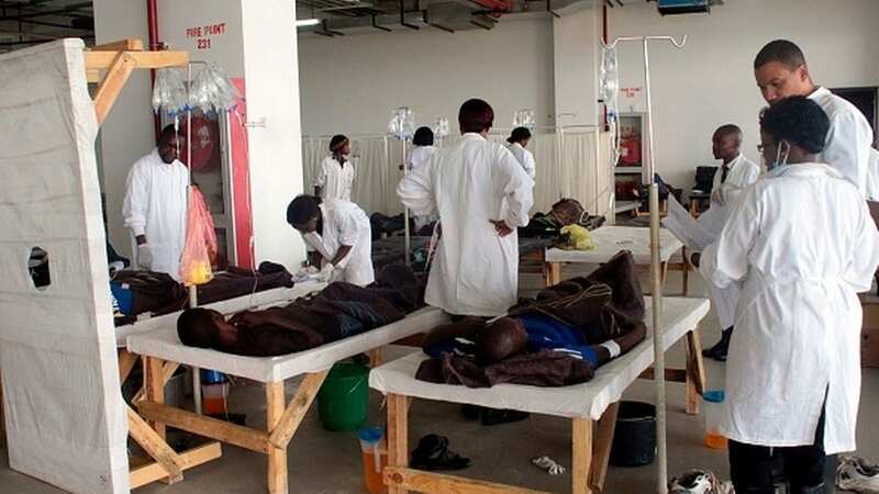 Doctors care for patients ill with cholera in Zambia (Image: AFP via Getty Images)