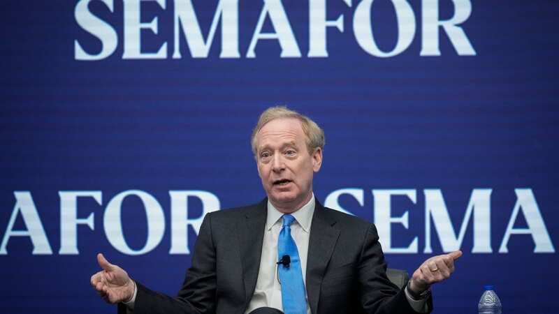 Microsoft President Brad Smith said the company is making its biggest single investment in Germany in its 40-year history there (Photo by Drew Angerer/Getty Images)