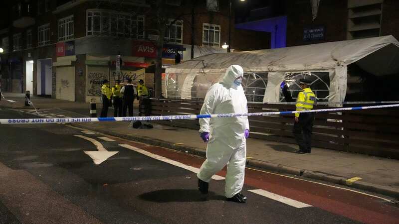 Police forensic officers attend the scene of a shooting in January 2023 (Image: Getty Images)