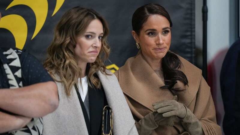 Meghan Markle spotted wearing a glamorous $1,295 Sentaler cape at the Invictus Games event (Image: WireImage)