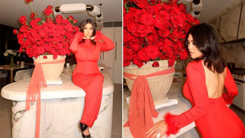 Kourtney Kardashian shows off Valentine’s Day flowers from husband Travis as he tours Australia