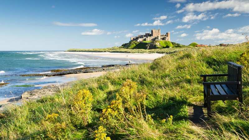 Bamburgh Castle dates back to the 6th or 7th century (Image: Getty Images/iStockphoto)