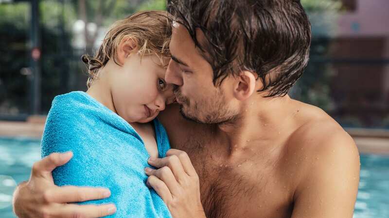 A parent is warning other mums and dads that wrapping your child in a towel a certain way could be a hazard (stock photo) (Image: Getty Images/Westend61)