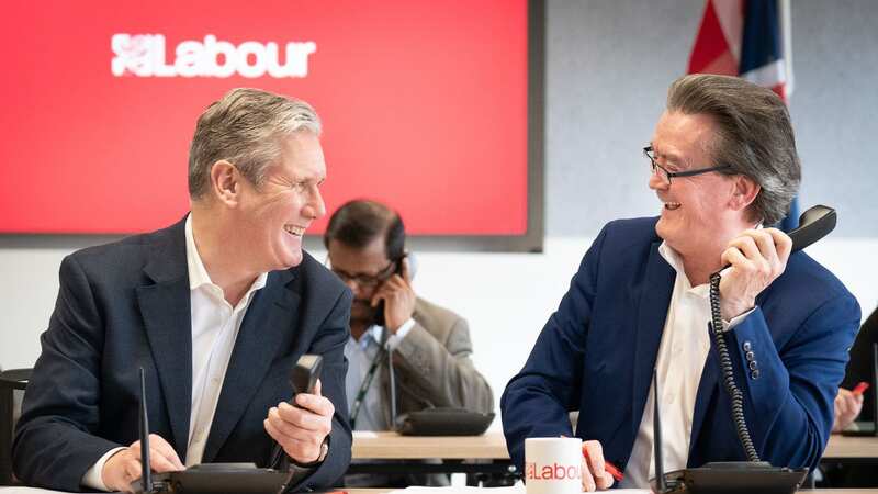 Labour leader Sir Keir Starmer (left) is joined by musician Feargal Sharkey canvassing voters by phone for the Wellingborough and Kingswood by-elections, at Labour HQ (Image: PA)