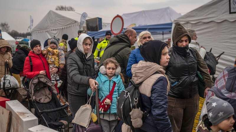 Around 200,000 refugees were allowed to come to the UK as part of three schemes (Image: AFP via Getty Images)