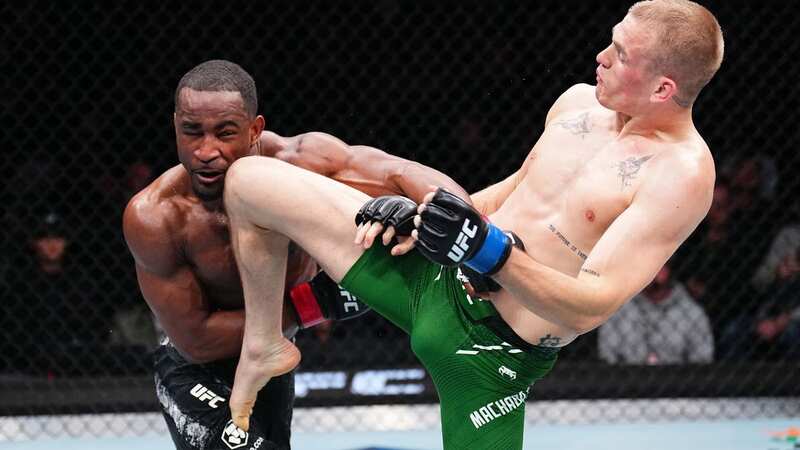 Ian Garry lands a knee on Geoff Neal in their UFC 298 fight