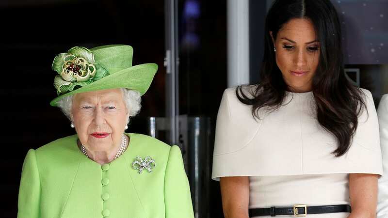 Prince Harry with the late Queen (Image: AFP)