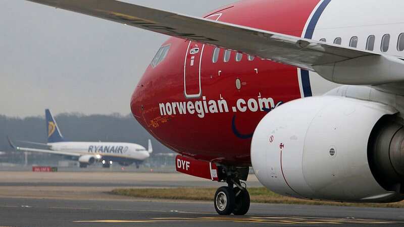The unauthorised passenger sneaked onto the Nowegian Air flight (Image: Bloomberg via Getty Images)