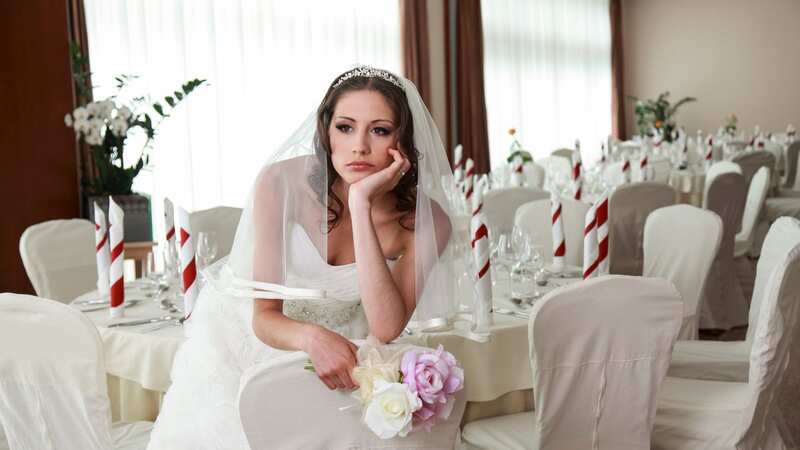 A woman who got brides mixed up is wondering if she is to blame (Image: Getty Images)