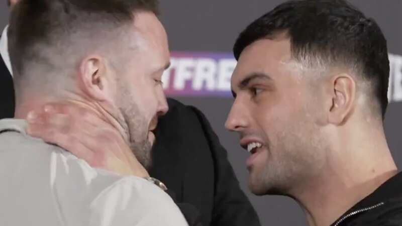 Jack Catterall grabs Josh Taylor by the throat (Image: DAZN)