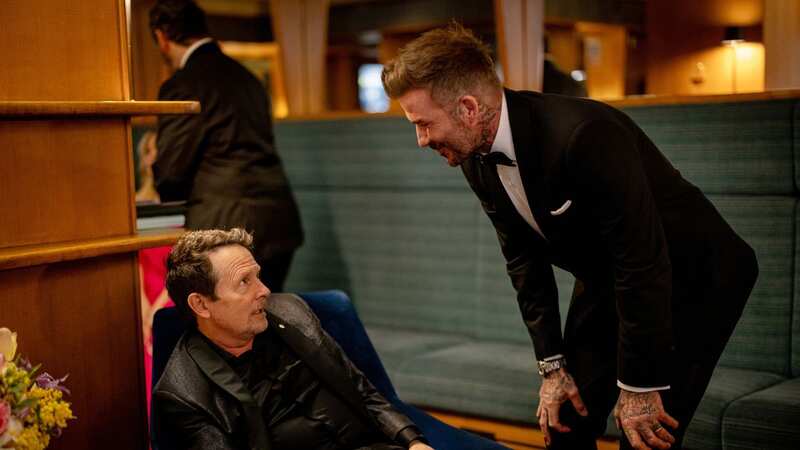Michael J. Fox and David Beckham backstage during the EE BAFTA Film Awards 2024 at The Royal Festival Hall in London (Image: BAFTA via Getty Images)